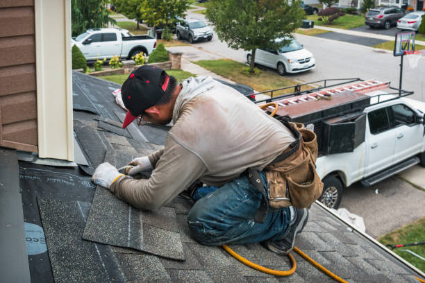 Professional Flat Roof Repair technician working in Moreland, GA